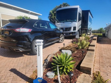 This primo lot in the luxury motorcoach section is once again on Deer Creek RV Golf Resort in Florida - for sale on GolfHomes.com, golf home, golf lot