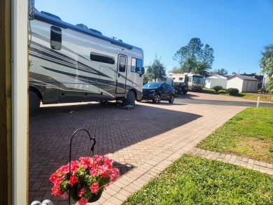This primo lot in the luxury motorcoach section is once again on Deer Creek RV Golf Resort in Florida - for sale on GolfHomes.com, golf home, golf lot