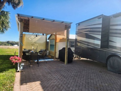 This primo lot in the luxury motorcoach section is once again on Deer Creek RV Golf Resort in Florida - for sale on GolfHomes.com, golf home, golf lot