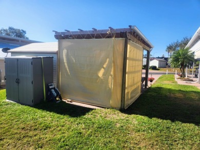 This primo lot in the luxury motorcoach section is once again on Deer Creek RV Golf Resort in Florida - for sale on GolfHomes.com, golf home, golf lot