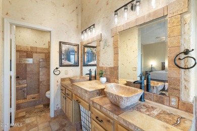 This extraordinary residence seamlessly blends elevated design on The Foothills Golf Club in Arizona - for sale on GolfHomes.com, golf home, golf lot