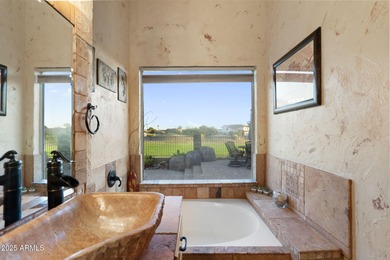 This extraordinary residence seamlessly blends elevated design on The Foothills Golf Club in Arizona - for sale on GolfHomes.com, golf home, golf lot