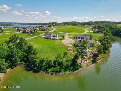 Nestled with breathtaking views of the main channel, this on Wind River Golf Course in Tennessee - for sale on GolfHomes.com, golf home, golf lot