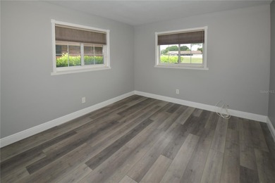 Tucked in a peaceful and highly sought-after Deed Restricted on Seminole Lake Country Club in Florida - for sale on GolfHomes.com, golf home, golf lot