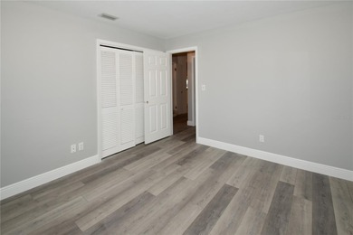 Tucked in a peaceful and highly sought-after Deed Restricted on Seminole Lake Country Club in Florida - for sale on GolfHomes.com, golf home, golf lot