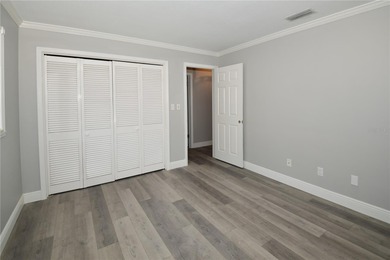 Tucked in a peaceful and highly sought-after Deed Restricted on Seminole Lake Country Club in Florida - for sale on GolfHomes.com, golf home, golf lot