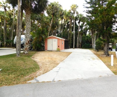 Very nice air-conditioned storage shed, with W/D, refrigerator & on The Great Outdoors Golf and Country Club in Florida - for sale on GolfHomes.com, golf home, golf lot