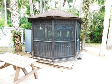 Very nice air-conditioned storage shed, with W/D, refrigerator & on The Great Outdoors Golf and Country Club in Florida - for sale on GolfHomes.com, golf home, golf lot