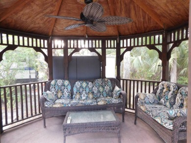 Very nice air-conditioned storage shed, with W/D, refrigerator & on The Great Outdoors Golf and Country Club in Florida - for sale on GolfHomes.com, golf home, golf lot