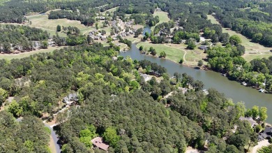 THIS IS A MEMBERSHIP AVAILABLE LOT - Wooded gently sloping to on Reynolds Lake Oconee - The Landing in Georgia - for sale on GolfHomes.com, golf home, golf lot
