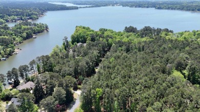 THIS IS A MEMBERSHIP AVAILABLE LOT - Wooded gently sloping to on Reynolds Lake Oconee - The Landing in Georgia - for sale on GolfHomes.com, golf home, golf lot