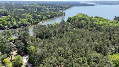 THIS IS A MEMBERSHIP AVAILABLE LOT - Wooded gently sloping to on Reynolds Lake Oconee - The Landing in Georgia - for sale on GolfHomes.com, golf home, golf lot