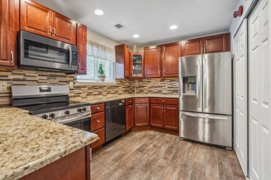 Beautifully updated 3 bedroom condo in the desirable Woodgate on Holbrook Country Club Golf Course in New York - for sale on GolfHomes.com, golf home, golf lot