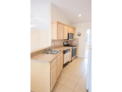 One or more photo(s) has been virtually staged. Welcome to easy on The Grand Club - Pine Lakes Course in Florida - for sale on GolfHomes.com, golf home, golf lot