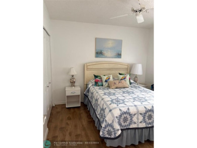 Beautiful spacious split plan 2 bedroom, 2 full bath condo with on Oriole Golf and Tennis Club in Florida - for sale on GolfHomes.com, golf home, golf lot