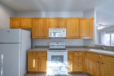 Expanded Cliffrose Model that makes living room, dining area and on Sunriver Golf Club in Utah - for sale on GolfHomes.com, golf home, golf lot