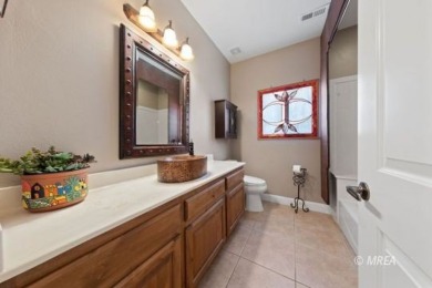 This beautifully designed home sits on a desirable corner lot on The Oasis Golf Club in Nevada - for sale on GolfHomes.com, golf home, golf lot
