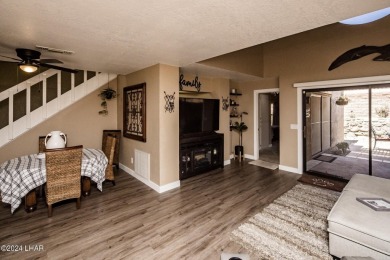 This golf course townhome is the perfect worry-free, lock and on London Bridge Golf Course in Arizona - for sale on GolfHomes.com, golf home, golf lot