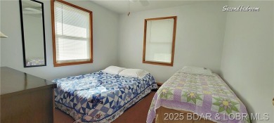 20 acre CAMPGROUND down the street from TRUMAN DAM, SWIM BEACH & on Shawnee Bend Golf Course in Missouri - for sale on GolfHomes.com, golf home, golf lot