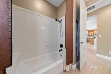 This beautifully designed home sits on a desirable corner lot on The Oasis Golf Club in Nevada - for sale on GolfHomes.com, golf home, golf lot
