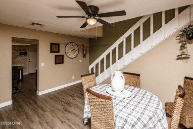 This golf course townhome is the perfect worry-free, lock and on London Bridge Golf Course in Arizona - for sale on GolfHomes.com, golf home, golf lot