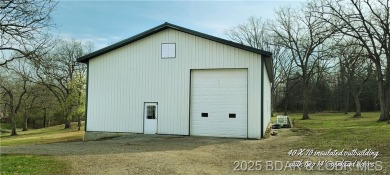 20 acre CAMPGROUND down the street from TRUMAN DAM, SWIM BEACH & on Shawnee Bend Golf Course in Missouri - for sale on GolfHomes.com, golf home, golf lot