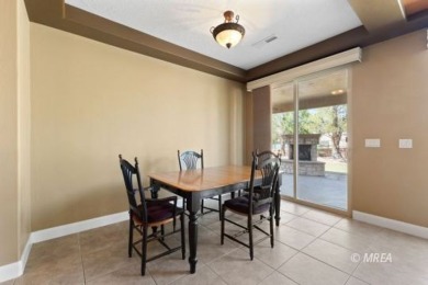 This beautifully designed home sits on a desirable corner lot on The Oasis Golf Club in Nevada - for sale on GolfHomes.com, golf home, golf lot