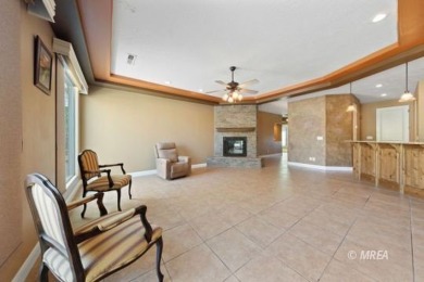 This beautifully designed home sits on a desirable corner lot on The Oasis Golf Club in Nevada - for sale on GolfHomes.com, golf home, golf lot