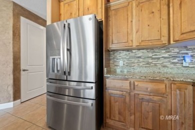 This beautifully designed home sits on a desirable corner lot on The Oasis Golf Club in Nevada - for sale on GolfHomes.com, golf home, golf lot