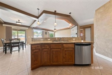 This beautifully designed home sits on a desirable corner lot on The Oasis Golf Club in Nevada - for sale on GolfHomes.com, golf home, golf lot