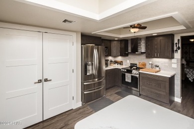 This golf course townhome is the perfect worry-free, lock and on London Bridge Golf Course in Arizona - for sale on GolfHomes.com, golf home, golf lot