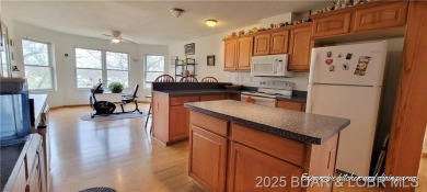 20 acre CAMPGROUND down the street from TRUMAN DAM, SWIM BEACH & on Shawnee Bend Golf Course in Missouri - for sale on GolfHomes.com, golf home, golf lot