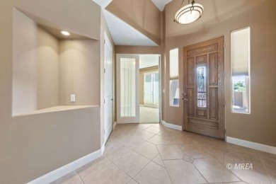This beautifully designed home sits on a desirable corner lot on The Oasis Golf Club in Nevada - for sale on GolfHomes.com, golf home, golf lot