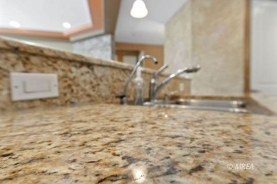 This beautifully designed home sits on a desirable corner lot on The Oasis Golf Club in Nevada - for sale on GolfHomes.com, golf home, golf lot