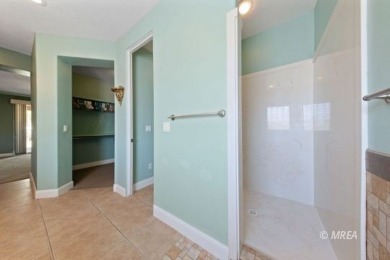This beautifully designed home sits on a desirable corner lot on The Oasis Golf Club in Nevada - for sale on GolfHomes.com, golf home, golf lot