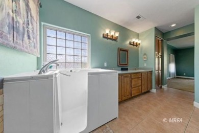This beautifully designed home sits on a desirable corner lot on The Oasis Golf Club in Nevada - for sale on GolfHomes.com, golf home, golf lot