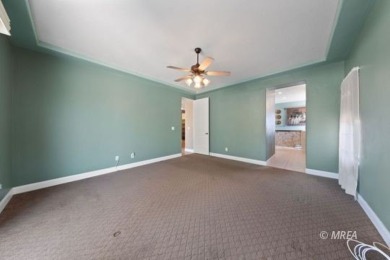 This beautifully designed home sits on a desirable corner lot on The Oasis Golf Club in Nevada - for sale on GolfHomes.com, golf home, golf lot