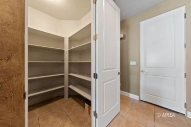 This beautifully designed home sits on a desirable corner lot on The Oasis Golf Club in Nevada - for sale on GolfHomes.com, golf home, golf lot