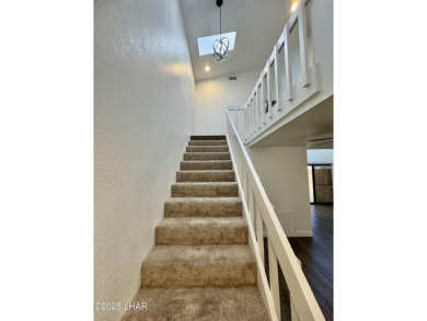 This golf course townhome is the perfect worry-free, lock and on London Bridge Golf Course in Arizona - for sale on GolfHomes.com, golf home, golf lot