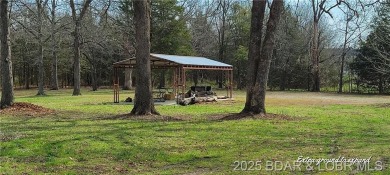 20 acre CAMPGROUND down the street from TRUMAN DAM, SWIM BEACH & on Shawnee Bend Golf Course in Missouri - for sale on GolfHomes.com, golf home, golf lot