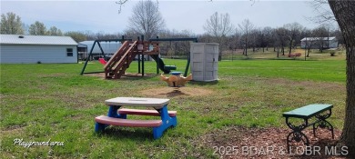 20 acre CAMPGROUND down the street from TRUMAN DAM, SWIM BEACH & on Shawnee Bend Golf Course in Missouri - for sale on GolfHomes.com, golf home, golf lot