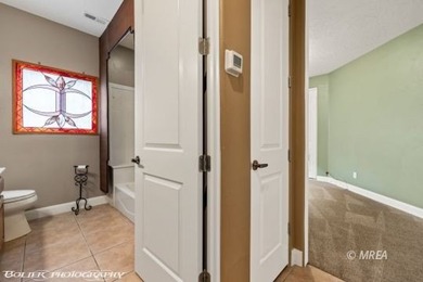 This beautifully designed home sits on a desirable corner lot on The Oasis Golf Club in Nevada - for sale on GolfHomes.com, golf home, golf lot