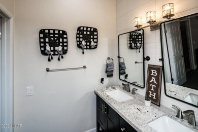 This golf course townhome is the perfect worry-free, lock and on London Bridge Golf Course in Arizona - for sale on GolfHomes.com, golf home, golf lot