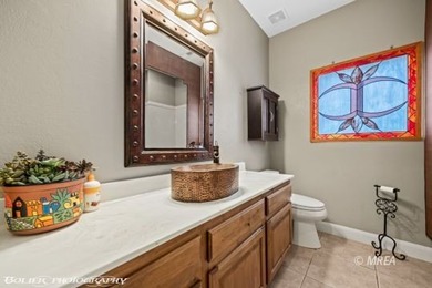 This beautifully designed home sits on a desirable corner lot on The Oasis Golf Club in Nevada - for sale on GolfHomes.com, golf home, golf lot