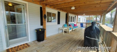 20 acre CAMPGROUND down the street from TRUMAN DAM, SWIM BEACH & on Shawnee Bend Golf Course in Missouri - for sale on GolfHomes.com, golf home, golf lot