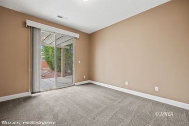 This beautifully designed home sits on a desirable corner lot on The Oasis Golf Club in Nevada - for sale on GolfHomes.com, golf home, golf lot