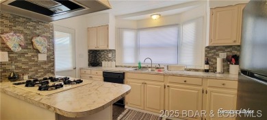 20 acre CAMPGROUND down the street from TRUMAN DAM, SWIM BEACH & on Shawnee Bend Golf Course in Missouri - for sale on GolfHomes.com, golf home, golf lot