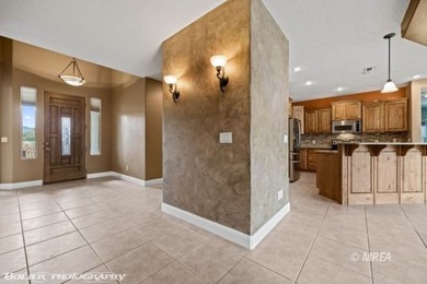 This beautifully designed home sits on a desirable corner lot on The Oasis Golf Club in Nevada - for sale on GolfHomes.com, golf home, golf lot