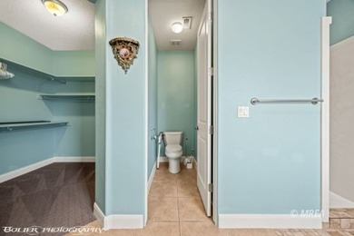 This beautifully designed home sits on a desirable corner lot on The Oasis Golf Club in Nevada - for sale on GolfHomes.com, golf home, golf lot