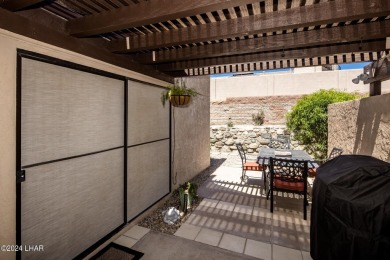 This golf course townhome is the perfect worry-free, lock and on London Bridge Golf Course in Arizona - for sale on GolfHomes.com, golf home, golf lot